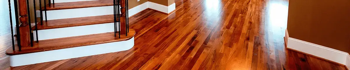 Base floor of a staircase with professionally restored wood flooring in Bellevue WA
