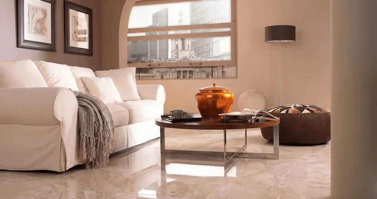 Modern living room with professionally installed marble flooring, a beige sofa, coffee table in Bellevue, WA