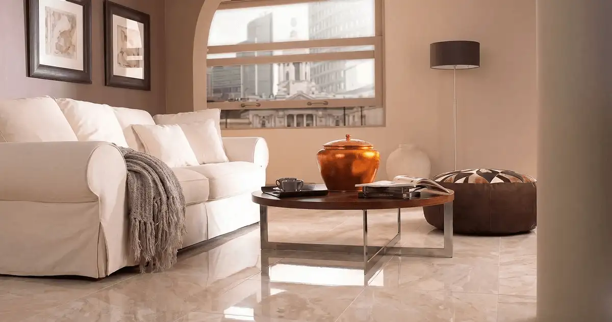 Modern living room with professionally installed marble flooring, a beige sofa, coffee table in Bellevue, WA