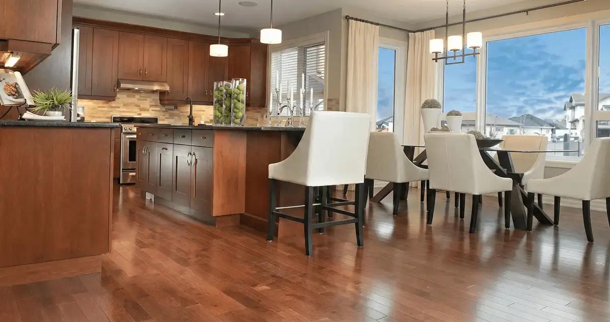 A modern kitchen with professionally installed wood flooring in Bellevue, WA